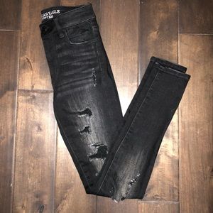 AE distressed black skinny jeans